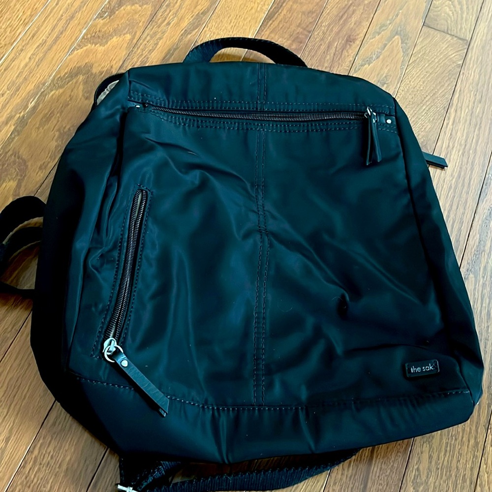 The Sak black tech backpack.